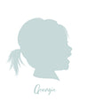 Silhouette portrait of a young girl laughing in a mint green color